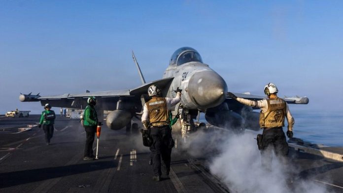 kapal-induk-as-luncurkan-jet-tempur-untuk-serang-iran-1772516506458_169